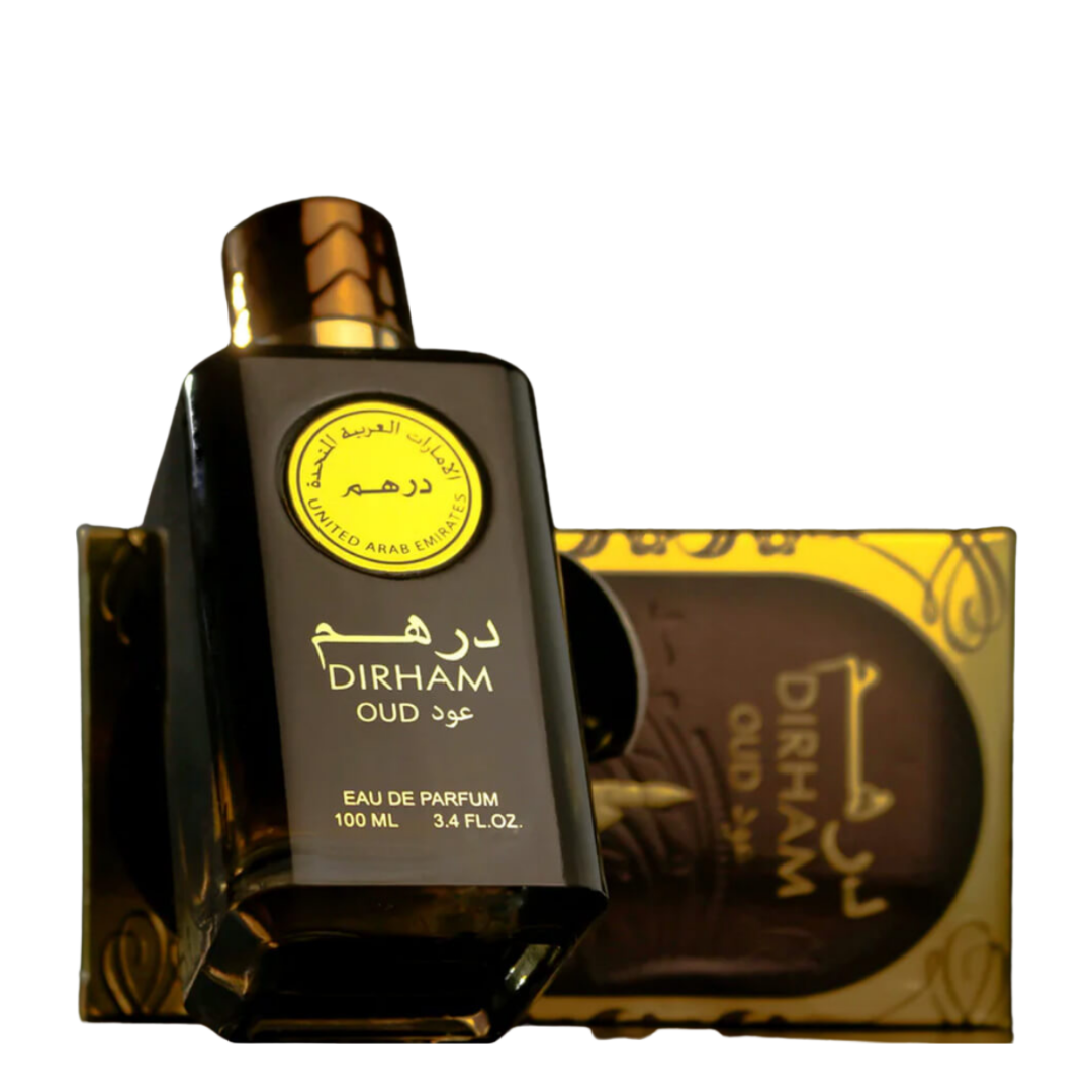 Luxury Dirham Oud perfume bottle by Ard Al Zaafaran lying on gold-accented gift box – Arabian oud fragrance