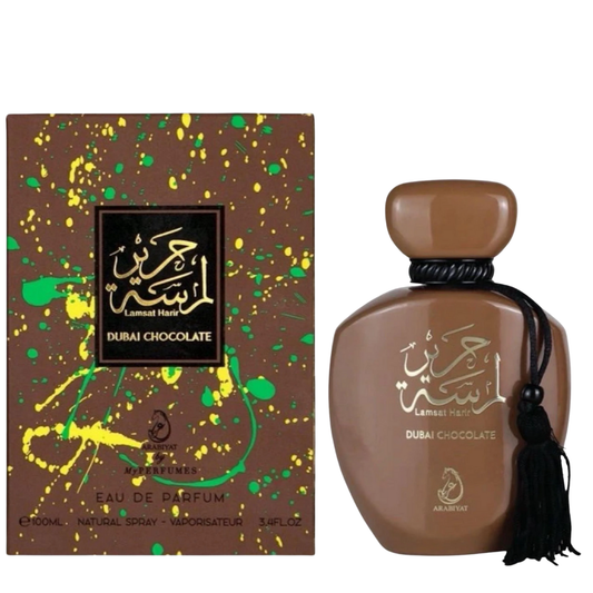 Brown perfume bottle and packaging with Arabic text on a white background. Dubai Chocolate by Arabiyat Unisex Perfume