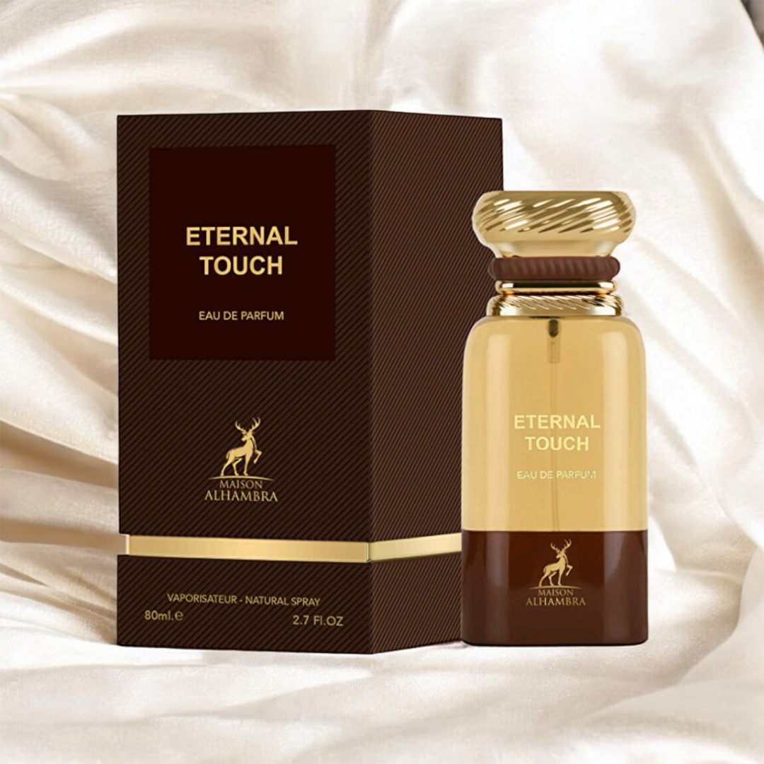 Eternal Touch Eau de Parfum bottle and packaging on a soft fabric background