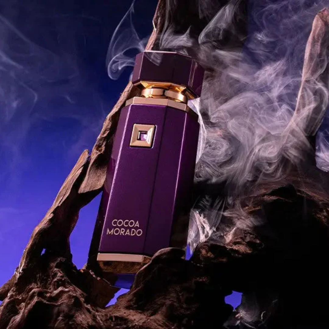 Purple perfume bottle labeled 'Cocoa Morado' with smoke effects on a dark background