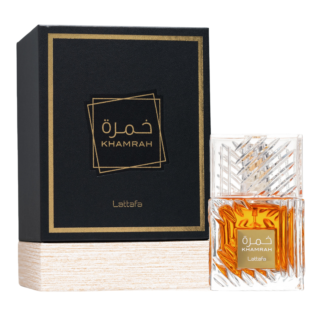 Clone / dupe of / inspired by Killian - Angels' Share unisex scents. Lattafa Khamrah Eau de Parfum with Luxury Perfume Box – Elegant amber fragrance in a premium clear glass bottle with intricate cuts, paired with a black and gold presentation box, perfect for niche perfume lovers.