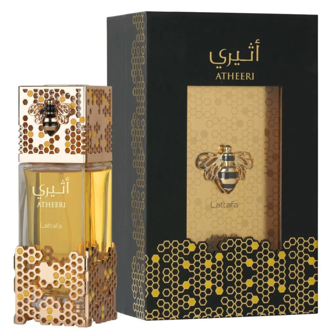 Atheeri perfume bottle and packaging with bee and honeycomb design on a white background. Lattafa Perfumes