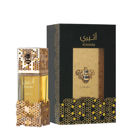 Atheeri perfume bottle and packaging with bee and honeycomb design on a white background. Lattafa Perfumes