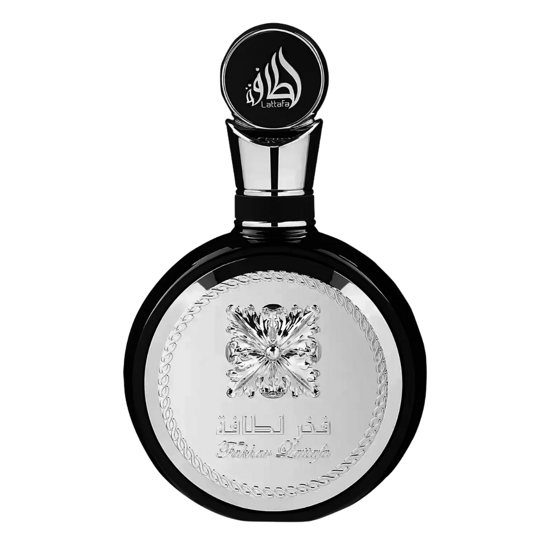 Lattafa Fakhar Black Eau de Parfum – Elegant Black and Silver Perfume Bottle
Luxurious Lattafa Fakhar Black perfume in a round black bottle with ornate silver detailing, offering a bold and sophisticated fragrance for men. Clone / dupe of / inspired by Yves Saint Laurent - Y perfume.