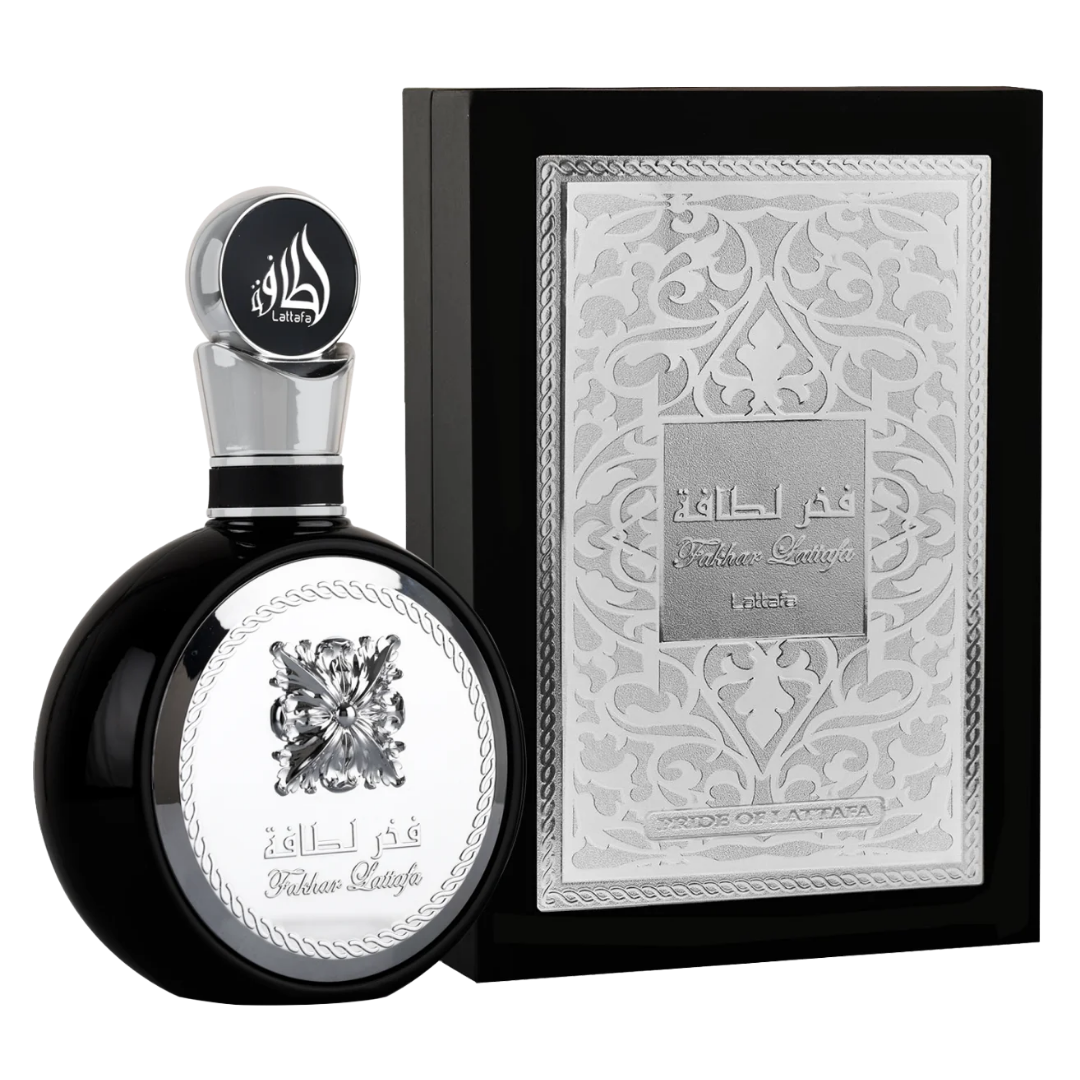 Lattafa Fakhar Black Perfume with Premium Packaging – Eau de Parfum for Men
Lattafa Fakhar Black fragrance bottle with intricate silver design alongside its luxury black and silver box, perfect for gifting. Clone / dupe of / inspired by Yves Saint Laurent - Y perfume.