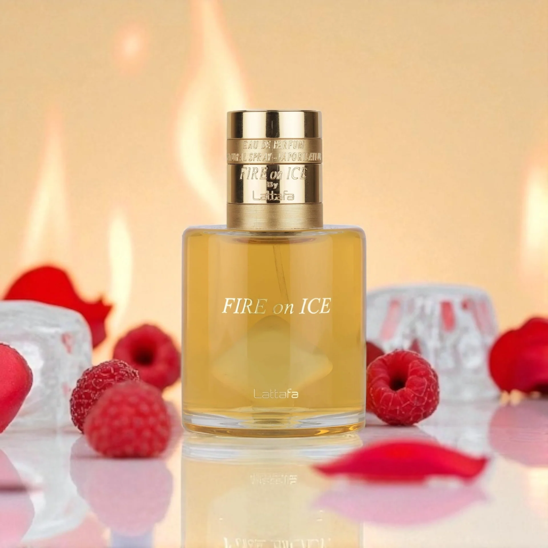 Perfume bottle labeled 'FIRE on ICE' with raspberries and ice cubes on a reflective surface.