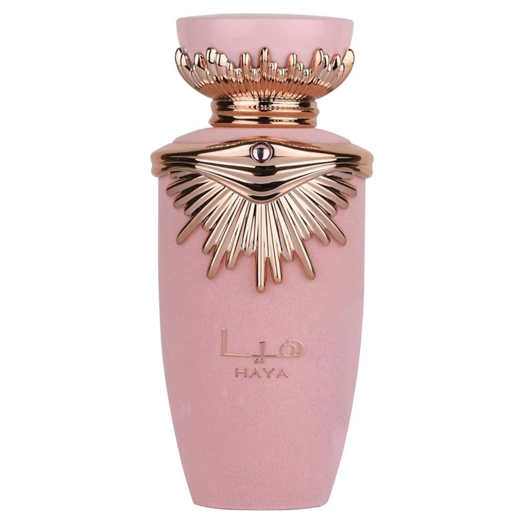 A bottle of Haya Perfume by Lattafa with a pink and gold color scheme.