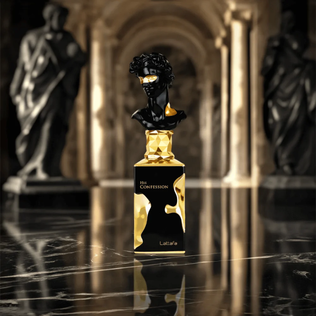Luxury perfume bottle with classical statue in the background. Lattafa His Confession Mens Perfume.