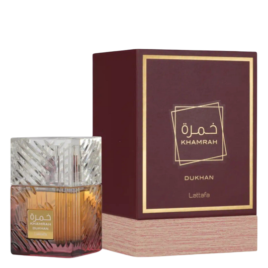 Lattafa Khamrah Dukhan perfume bottle with matching burgundy and gold packaging β opulent unisex fragrance featuring smoky, spicy, and sweet gourmand notes.