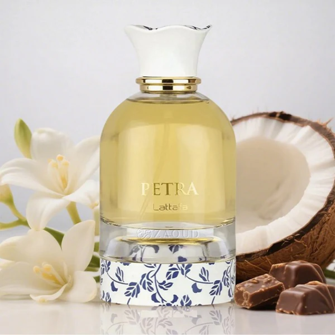 Petra Lattafa perfume bottle with coconut, flowers, and chocolate on a light background