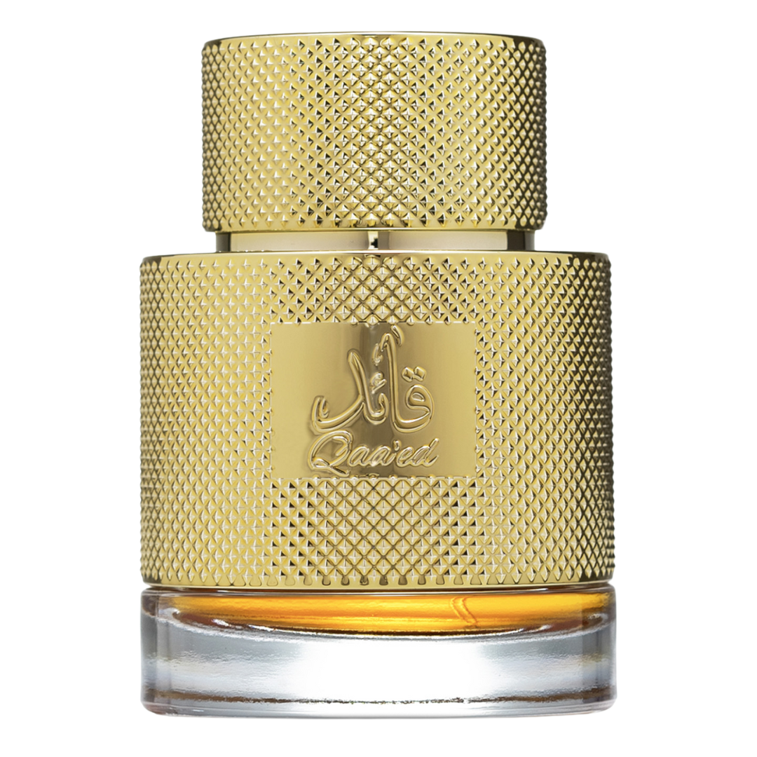 A luxurious gold-colored perfume bottle with a textured cap and the brand name 'Lattafa' displayed prominently. Clone / dupe of / inspired by Dolce & Gabbana - Velvet Desert Oud perfume. Qaa’ed by Lattafa golden perfume bottle with intricate textured design, placed alongside premium black and gold packaging, representing Middle Eastern luxury scents.