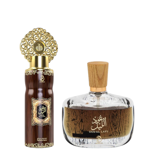 Two perfume bottles with decorative caps on a white background. Oud Al Layl Giftset by Arabiyat Unisex Perfume