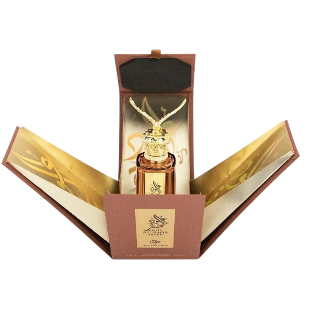 Oud Al Saqr Antar Eau de Parfum in open luxury presentation box with golden interior and Arabic calligraphy design.