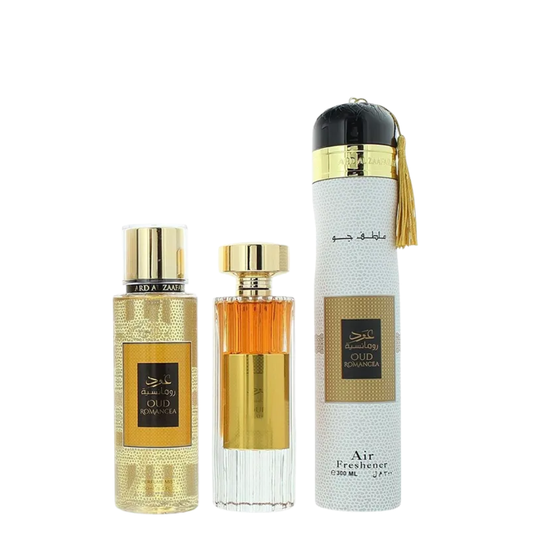 Three perfume bottles with gold and black labels on a white background. Oud Romancea Giftset by Ard Al Zaafaran Womens Perfume