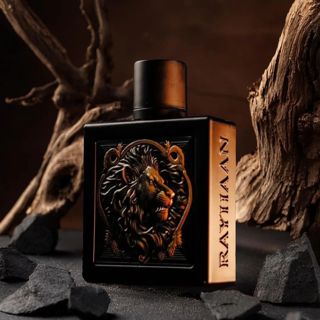 Black and bronze bottle with lion emblem and 'Rayhaan' branding against a dark background. Rayhaan Lion Mens Perfume