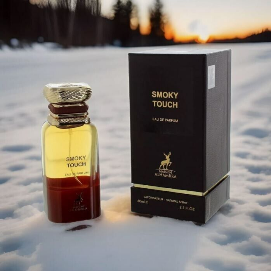 Perfume bottle and packaging labeled 'Smoky Touch' on a snowy background