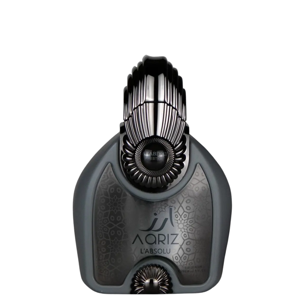 Aariz L’Absolu Perfume bottle with a black and silver design, featuring intricate patterns and the brand name prominently displayed. Aariz  L’Absolu by Arabiyat Prestige Unisex Perfume
