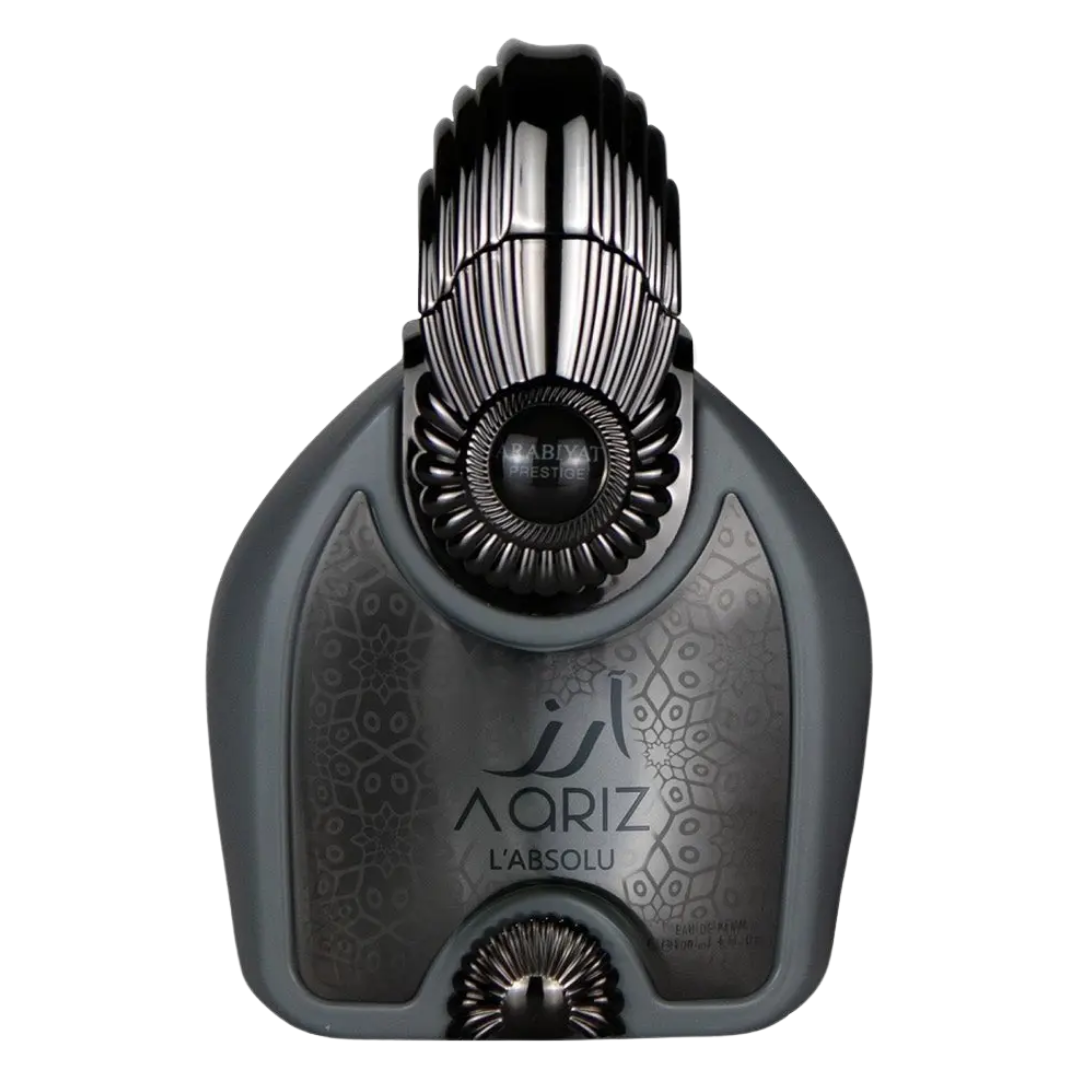 Aariz L’Absolu Perfume bottle with a black and silver design, featuring intricate patterns and the brand name prominently displayed. Aariz  L’Absolu by Arabiyat Prestige Unisex Perfume