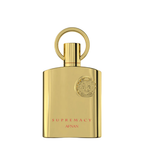 A gold metallic perfume bottle with a circular ring cap, featuring the brand name AFNAN and the fragrance name SUPREMACY in red lettering, set against a plain white background. Afnan: Supremacy Gold.