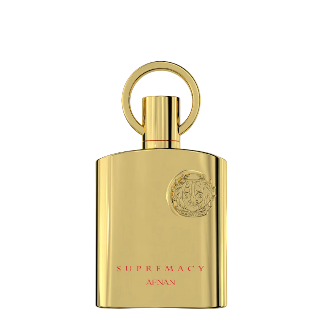 A gold metallic perfume bottle with a circular ring cap, featuring the brand name AFNAN and the fragrance name SUPREMACY in red lettering, set against a plain white background. Afnan: Supremacy Gold.