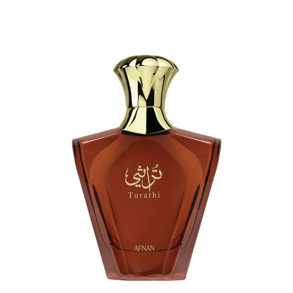 A bottle of Afnan Turathi Brown perfume with a faceted amber-brown glass body and a shiny gold cap, set against a plain white background.