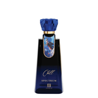 A dark blue glass bottle of Chill Spectrum by Ahmed, featuring a faceted blue cap, a gold collar, and a blue and white graphic label on the neck, set against a plain white background.
