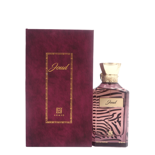 Perfume bottle with zebra pattern and matching box on a white background. Ahmed Al Maghribi Joud Unisex Perfume