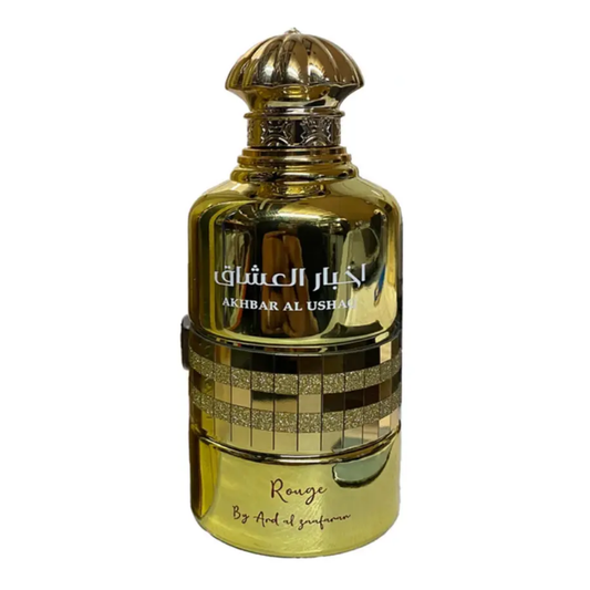 Gold perfume bottle with decorative cap on a white background. Akhbar Al Ushaq Rouge by Ard Al Zaafaran Womens Perfume