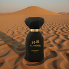 Arabiyat Prestige Al Noor bottle in a desert setting