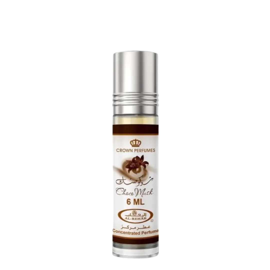 A 6 ml roll-on perfume bottle with a silver cap and a white label featuring brown accents and Arabic text, branded Crown Perfumes, on a plain white background. Al Rehab: Choco Musk