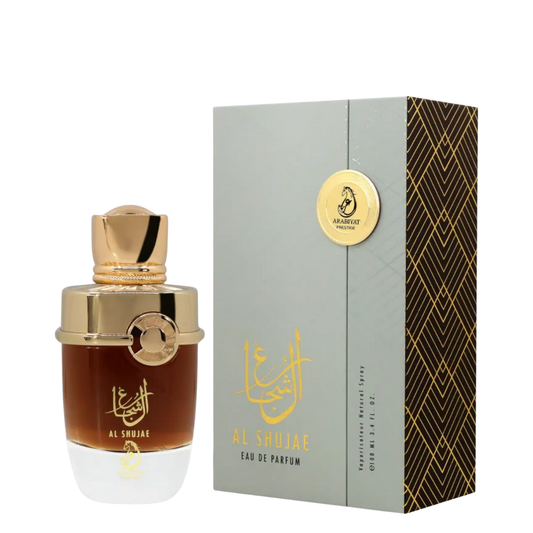 Al Shujae perfume bottle with gold cap and packaging on a white background. Al Shujae by Arabiyat Prestige Unisex Perfume