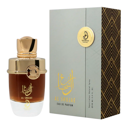 Al Shujae perfume bottle with gold cap and packaging on a white background. Al Shujae by Arabiyat Prestige Unisex Perfume