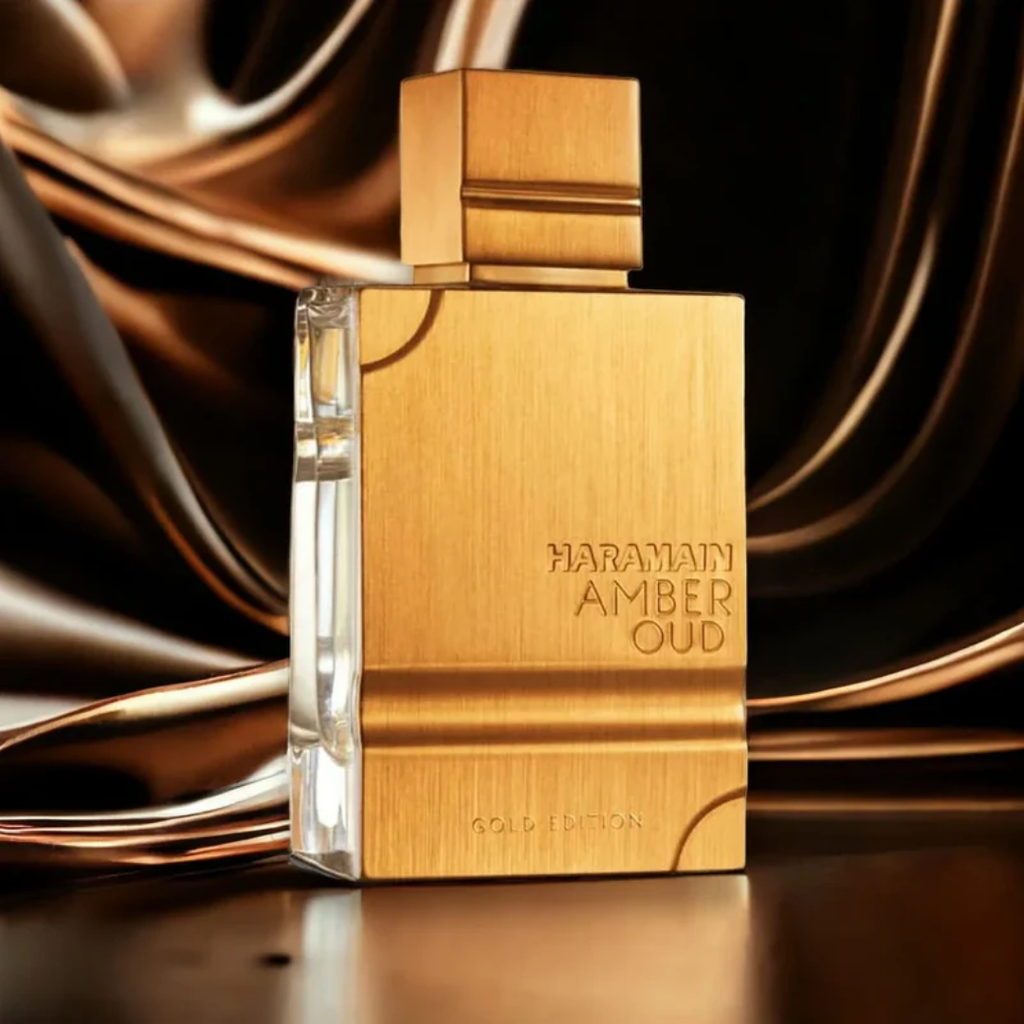 Gold Haraamain Amber Oud perfume bottle on a dark background. Amber Oud Gold Edition by Al Haramain Unisex Perfume
