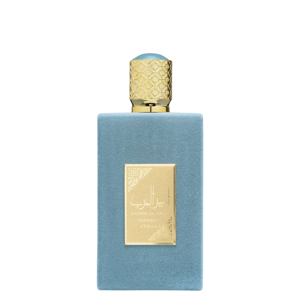 A blue bottle of Ameer Al Arab Imperium perfume with a gold cap and label, on a white background.