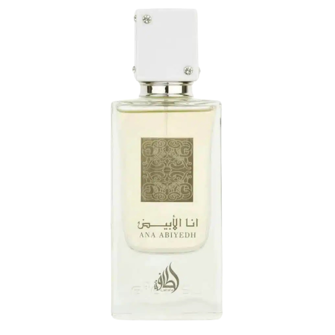 Lattafa Ana Abiyedh Eau de Parfum – elegant unisex fragrance in a clear glass bottle with white jeweled cap, featuring intricate gold label design. A glass bottle of Ana Abiyedh perfume by Lattafa with a white cap and a label featuring geometric patterns. Clone / dupe of / inspired by Xerjoff - Erba Pura perfume.