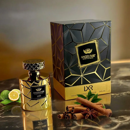 Gold perfume bottle and packaging with geometric design on a reflective surface. Angelixir by LXR Perfumes.
