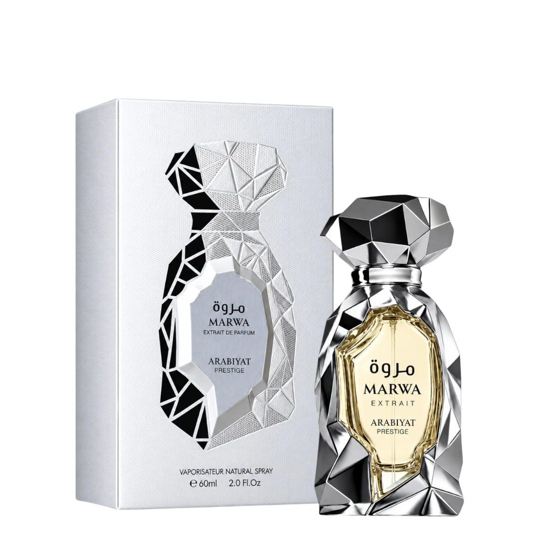 Marwa Extrait Arabiyat Prestige perfume bottle and its silver packaging box, both featuring a faceted diamond-like silver design with a clear label.