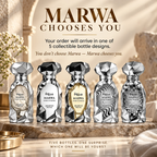 Five faceted perfume bottles in silver, black, gold, gray, and white designs are lined up on a stone pedestal with promotional text above reading 'MARWA CHOOSES YOU'.