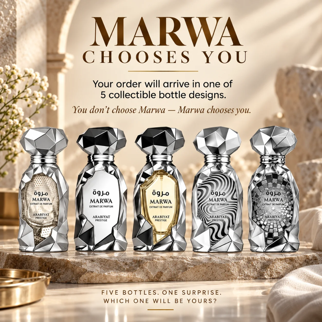 Five faceted perfume bottles in silver, black, gold, gray, and white designs are lined up on a stone pedestal with promotional text above reading 'MARWA CHOOSES YOU'.