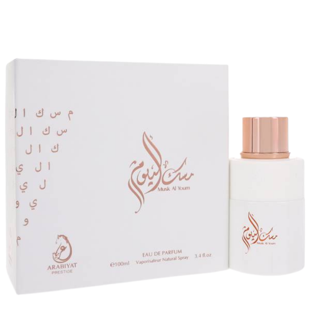 Arabiyat Prestige Musk Al Youm 100ml EDP – luxury unisex perfume with white box and rose gold Arabic script design. 