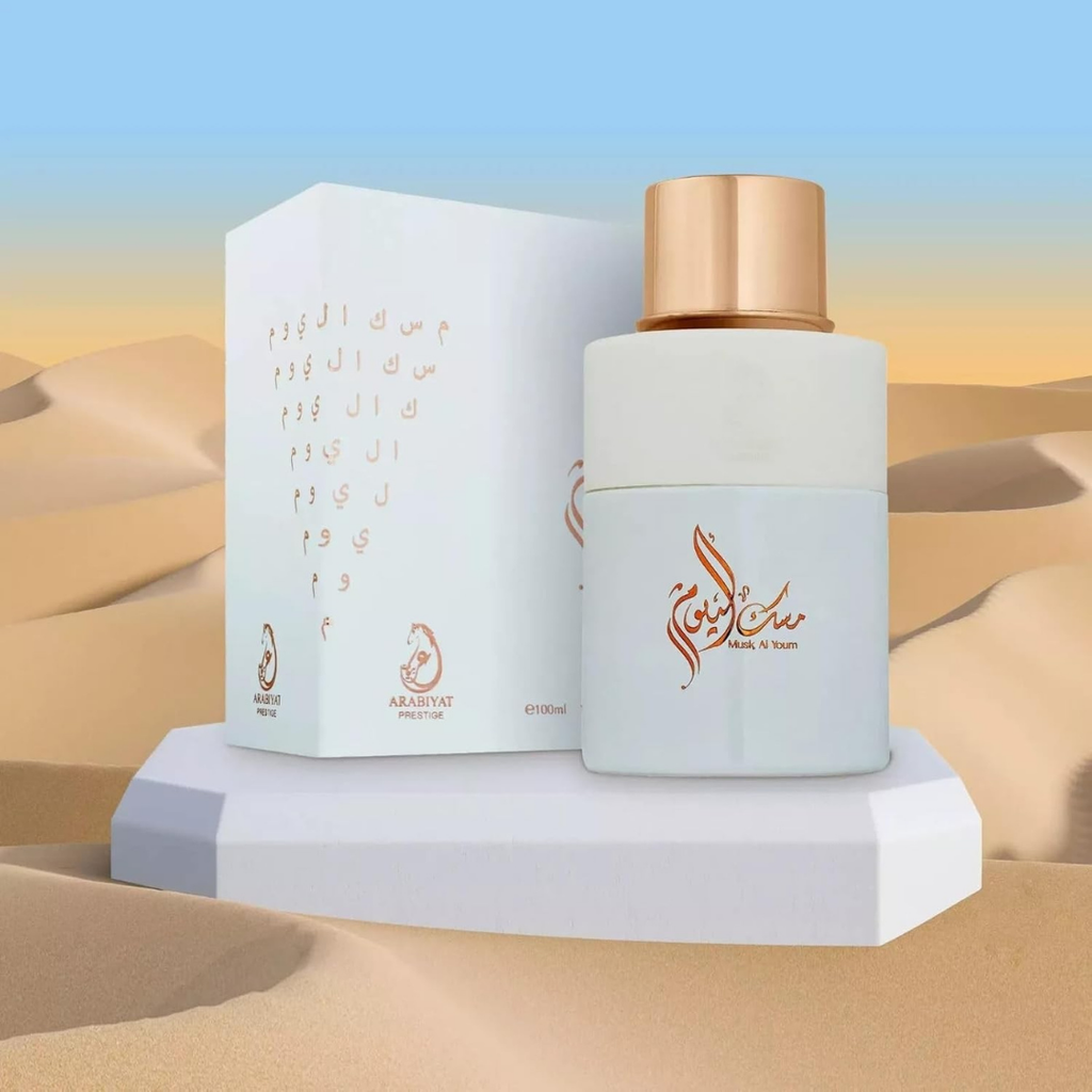 Musk Al Youm Eau de Parfum 100ml by Arabiyat Prestige – unisex Arabian musk fragrance in desert-themed display. 