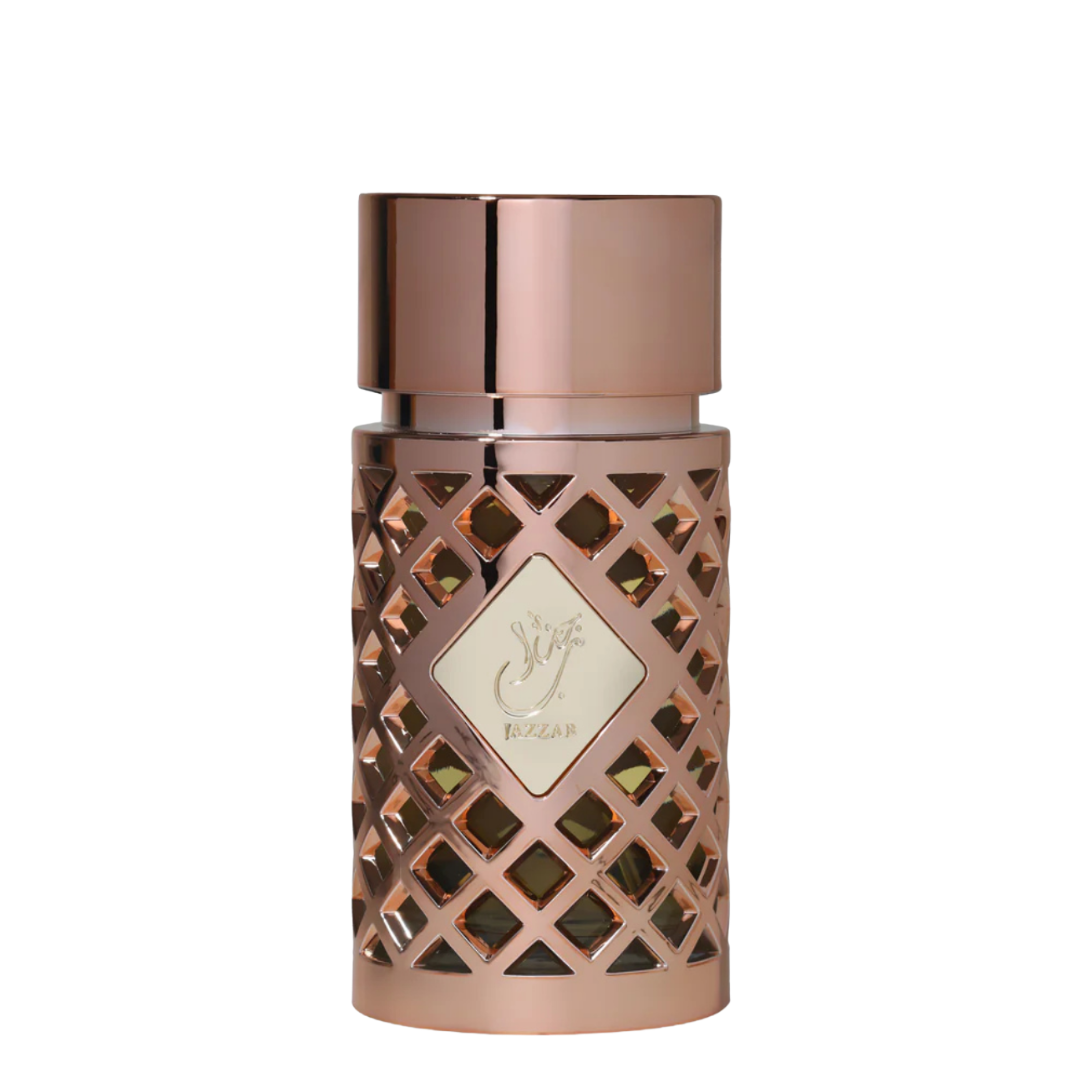 A bottle of luxury perfumes Jazzab Gold Perfume by Ard Al Zaafaran with a pink and gold color scheme, featuring a geometric pattern on the surface. Jazzab Eau de Parfum women's fragrance – premium gold lattice perfume bottle with Arabic calligraphy label, 100ml.