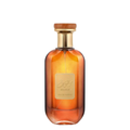 A glass bottle of Mousuf Perfume by Ard Al Zaafaran with a wooden cap and a label in front, displaying the name and fragrance type.  Amber Gradient Mousuf Perfume Bottle – Elegant amber gradient glass bottle of Mousuf Eau de Parfum with a gold and wood-accented cap, exuding luxury and oriental fragrance allure.