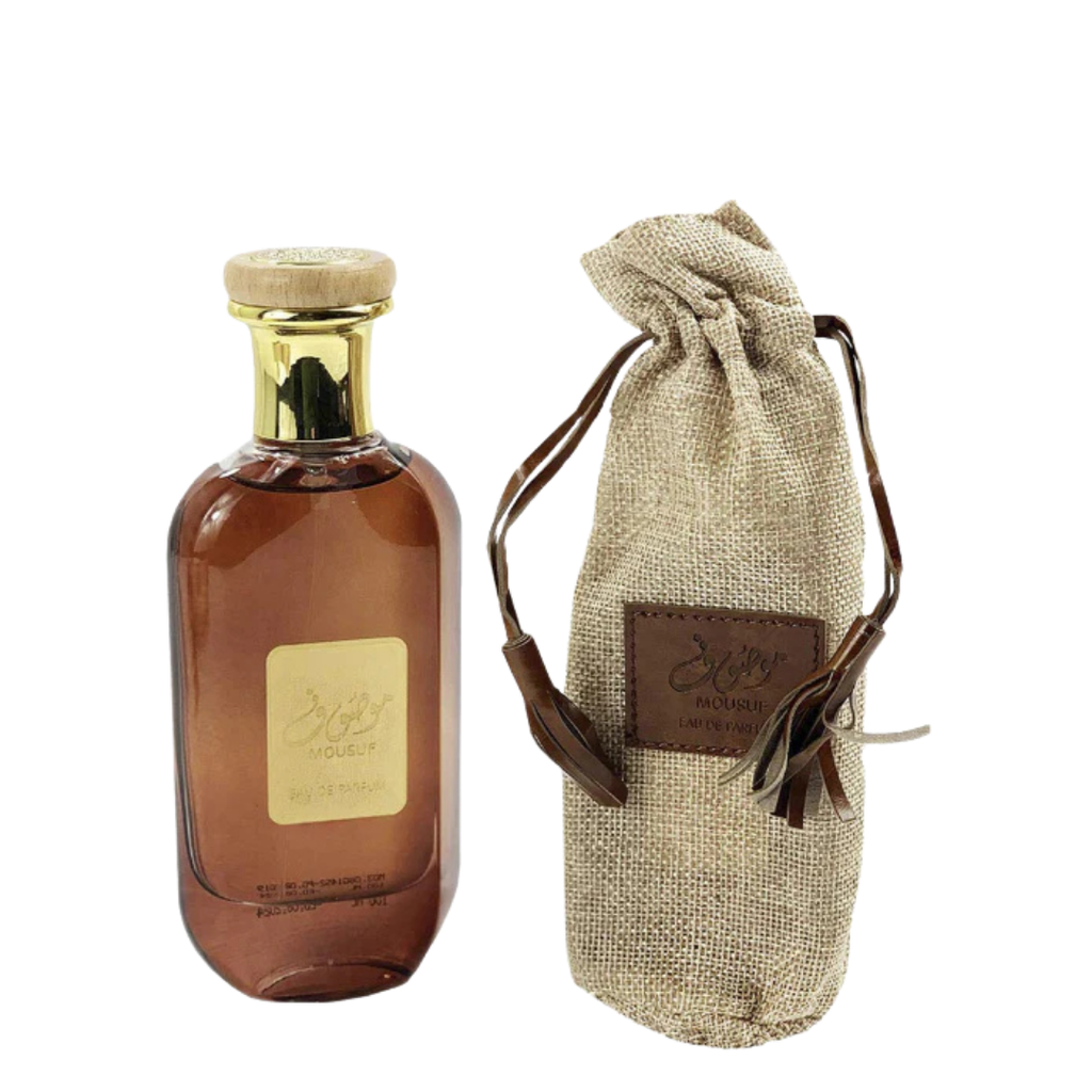 Mousuf Eau de Parfum with Burlap Gift Pouch – Sophisticated Mousuf perfume bottle paired with a rustic burlap drawstring pouch, combining artisanal charm and premium scent presentation. 