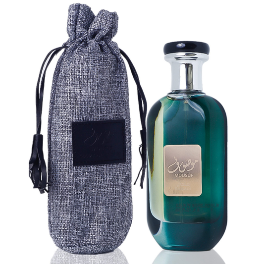 Mousuf Ramadi perfume with luxury drawstring pouch – premium unisex Arabian fragrance in emerald green bottle with silver details, presented with a stylish grey fabric pouch. Clone / dupe of / inspired by Jean Paul Gaultier - Ultra Male perfume.