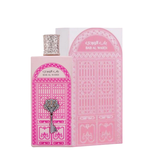 Pink perfume bottle with decorative cap and matching box on a white background. Bab Al Wardi by Ard Al Zaafaran Womens Perfume