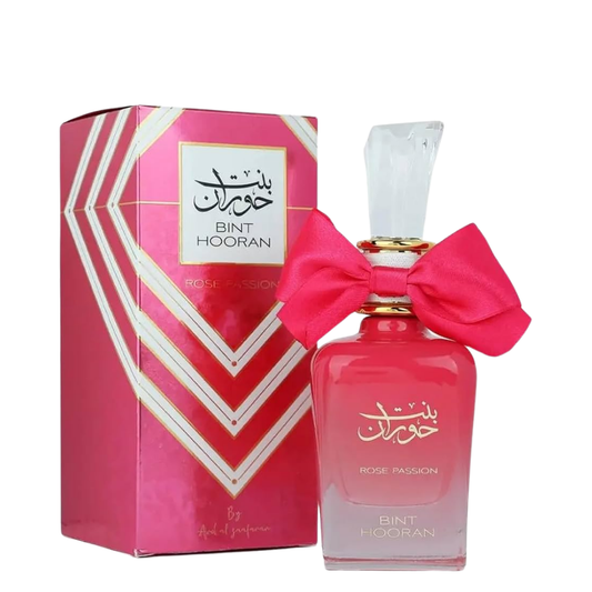 Perfume bottle with pink bow and packaging box. Bint Hooran Rose Passion Womens Perfume by Ard Al Zaafaran