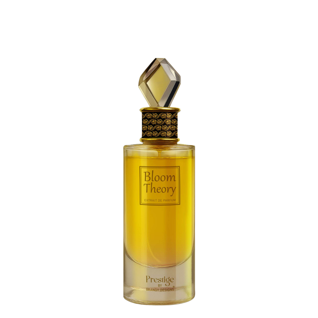 Gold perfume bottle with clear cap on a white background. Bloom Theory by Brandy Designs Unisex Perfume.