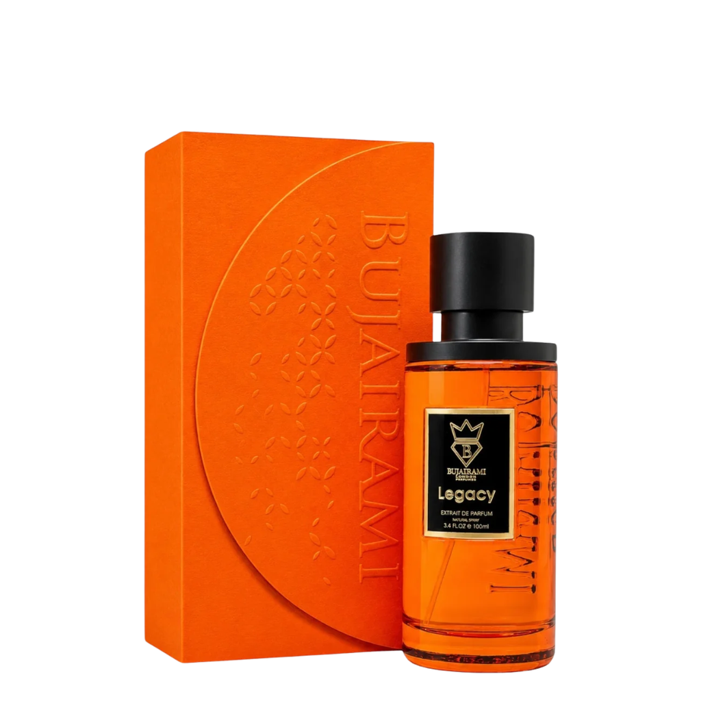 Bujairami Legacy perfume bottle with amber liquid and a black cap, standing next to its matching orange box on a white background.