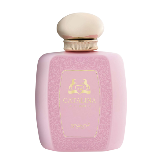 Pink bottle of Catalina Brandy with a gold cap on a white background